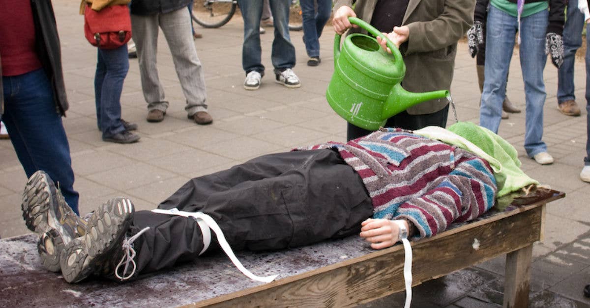 Demonstration of waterboarding at a street protest during a visit by Condoleezza Rice to Iceland, May 2008. Photo by Flickr user Karl Gunnarsson.