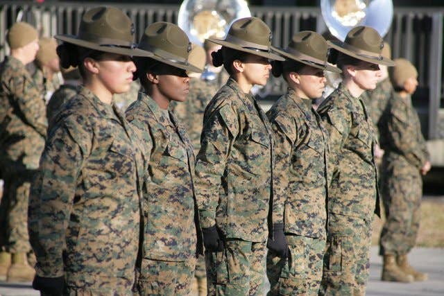 Female drill instructors at a Marine Corps basic training graduation practice (U.S. Marine Corps photo by Lance Cpl. Vincent White)