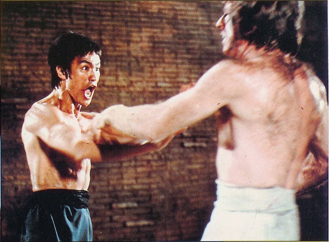 Pictured: The last ass-whipping Chuck Norris ever took. (Image from Golden Harvest's Return of the Dragon).