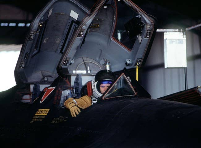 Pilot mans the brakes as the SR-71 is towed out of the hangar. (Photo: U.S. Air Force)