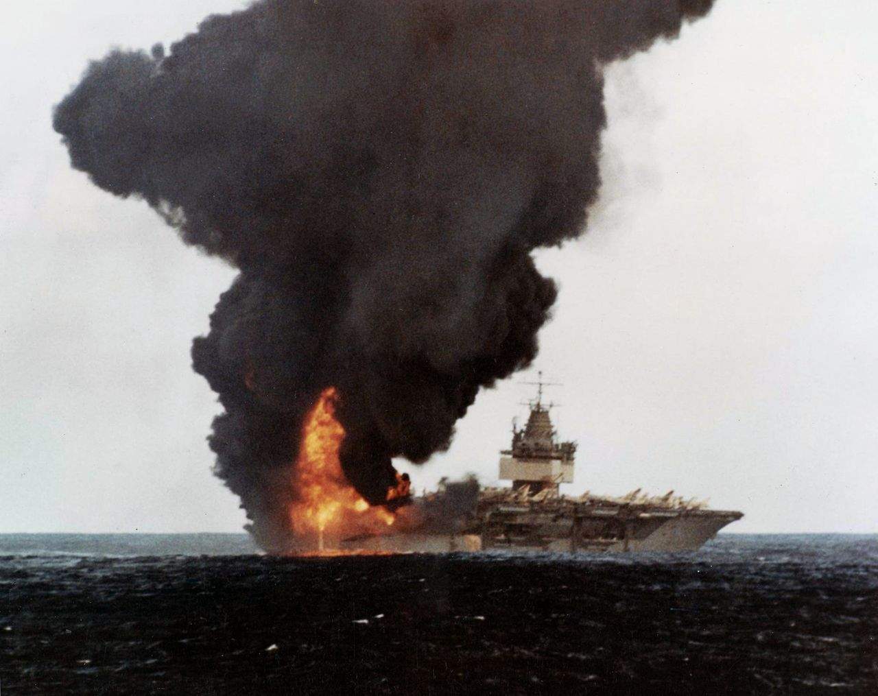 U.S. Navy aircraft carrier USS Enterprise (CVAN-65) on fire after air operations 14 January 1969. (U.S. Navy)