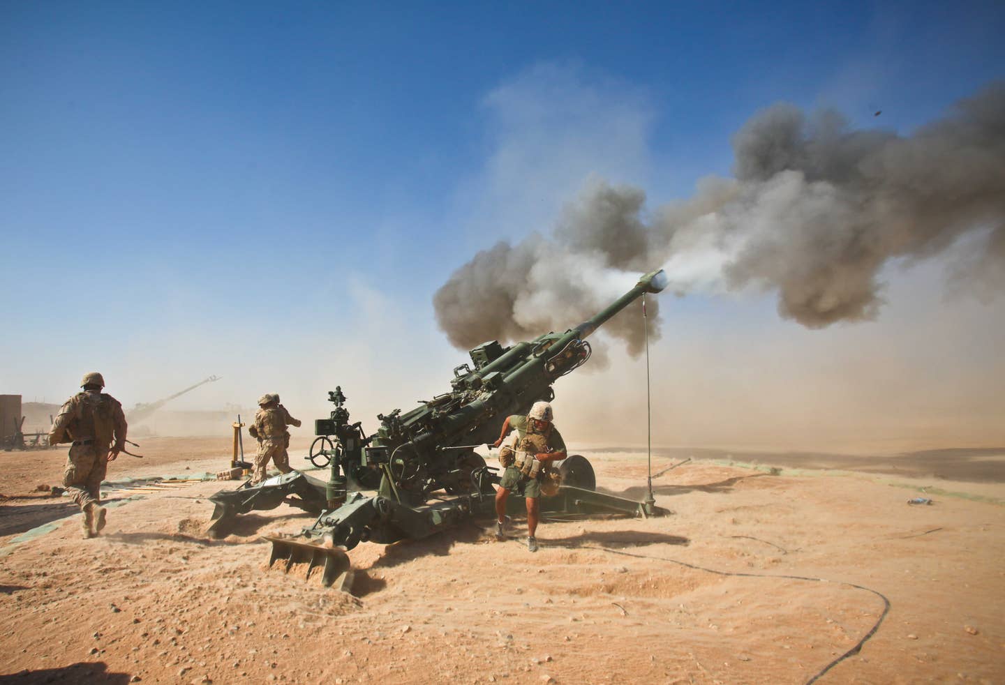 Marines with Charlie Battery, 1st Battalion, 12th Marine Regiment, fire an M982 Excalibur round from an M777 howitzer during a recent fire support mission. (US Marine Corps photo)