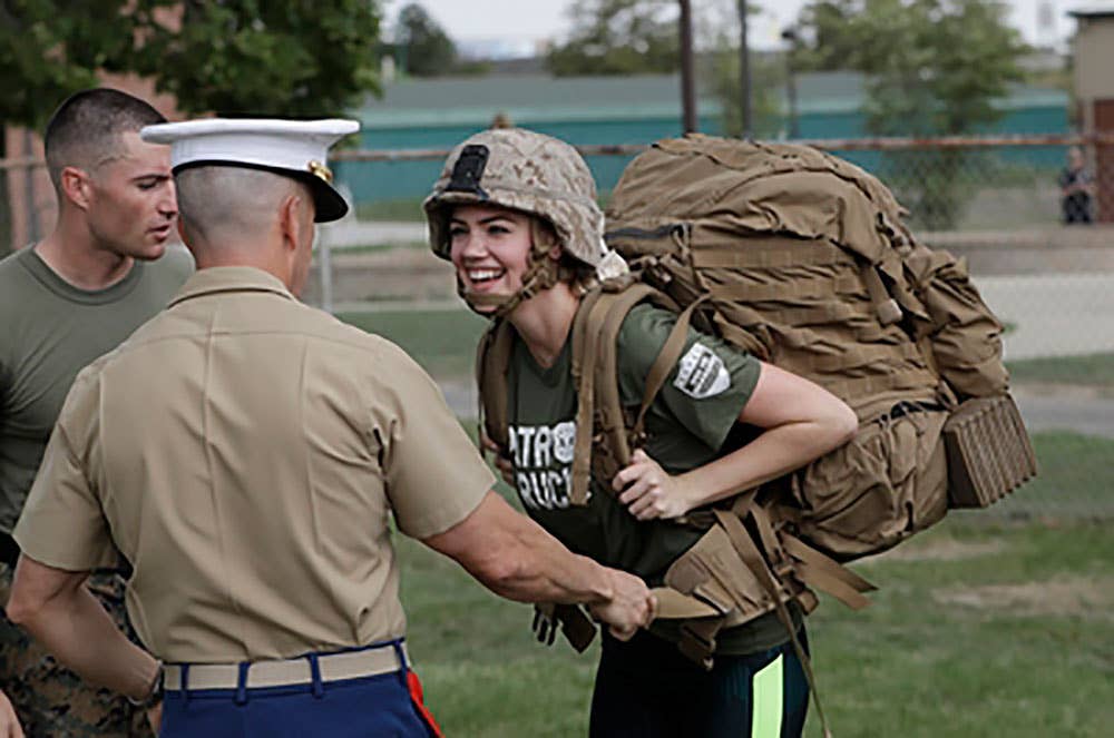 Time to ruck up Miss Upton! (Photo from AP via News Edge)
