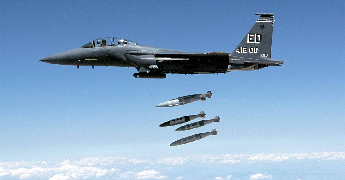 Four 2,000-pound Joint Direct Attack Munitions are released from an F-15E during a developmental test at Edwards Air Force Base in 2002. JDAM is known as the warfighter's weapon of choice because of its accuracy, reliability, and low cost. Photo courtesy of USAF.
