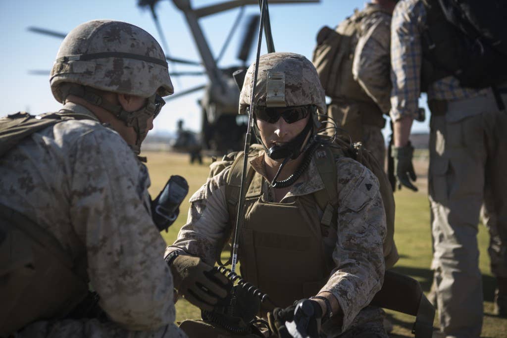 Marines establish communications during an embassy evacuation exercise. Photo: US Marine Corps Lance Cpl. Jodson B. Graves