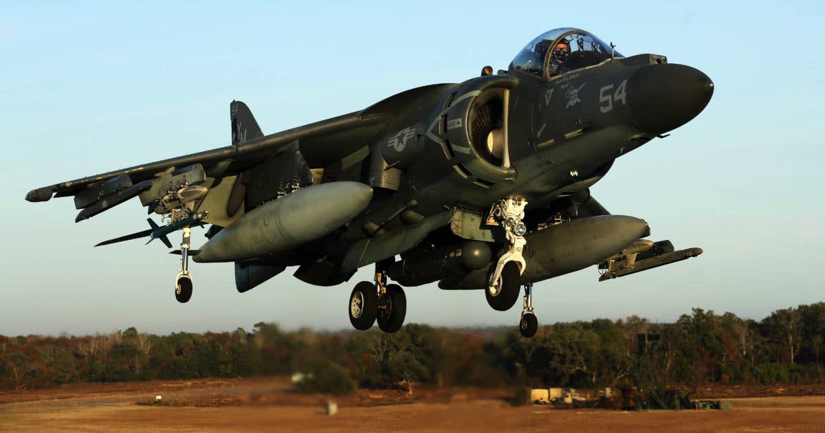 Maj. James S. Tanis lands an AV-8B Harrier during field carrier landing practice sustainment training at Marine Corps Auxiliary Landing Field Bogue, N.C., Dec. 5, 2014. (U.S. Marine Corps photo by Cpl. J. R. Heins)