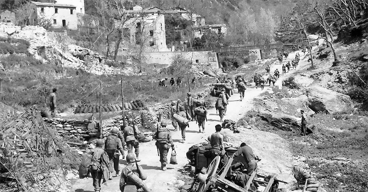 Soldiers of the 92nd Infantry Division pursue the retreating Germans through the Po Valley, Italy, April 1945. (Photo from U.S. Army)