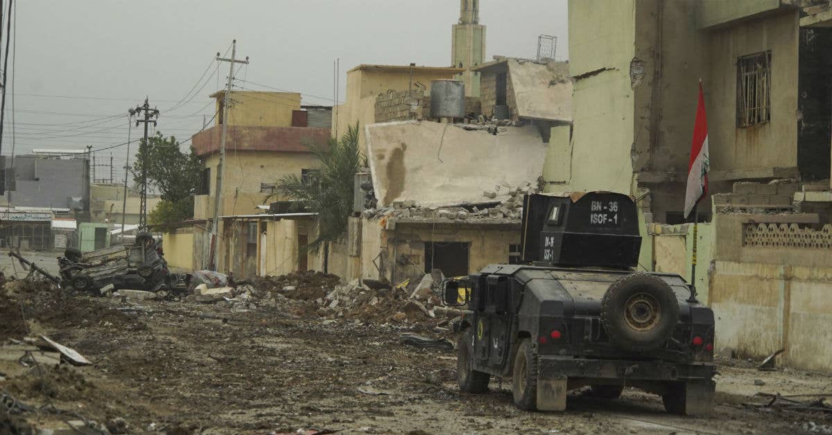 An ISOF APC among the rubble in Mosul, Iraq. Photo by Mstyslav Chernov