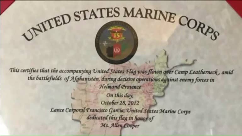 One of the many certificates Mrs. Cooper has received from troops she has written to. (Video screenshot from WGNTV.com)