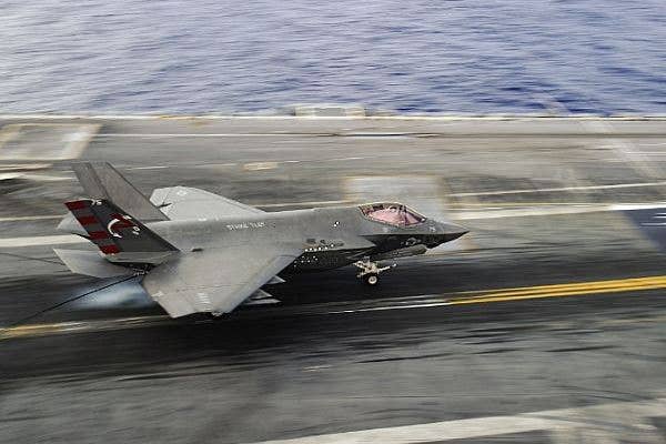 An F-35C Lightning II assigned to the Salty Dogs of Air Test and Evaluation Squadron (VX) 23 lands on the flight deck of the aircraft carrier USS George Washington (CVN 73) on Aug. 15, 2016, in the Atlantic Ocean. | US Navy photo by Wyatt L. Anthony