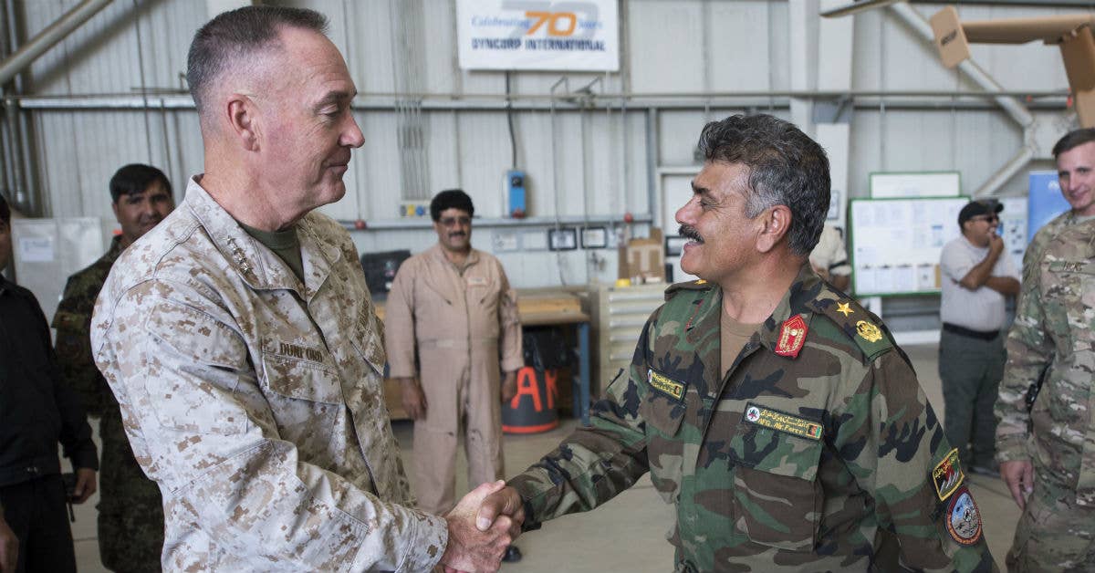 Marine Gen. Joseph F. Dunford Jr., chairman of the Joint Chiefs of Staff, meets with Afghan Air Force Brig. Gen. Eng A. Shafi. DoD Photo by Navy Petty Officer 2nd Class Dominique A. Pineiro.