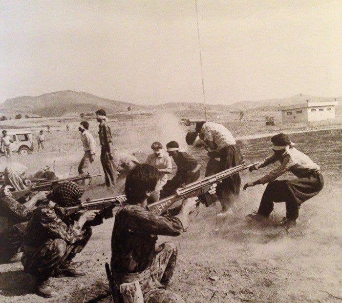 1980 - Iranian Republican Guardsmen executing Kurdish rebels