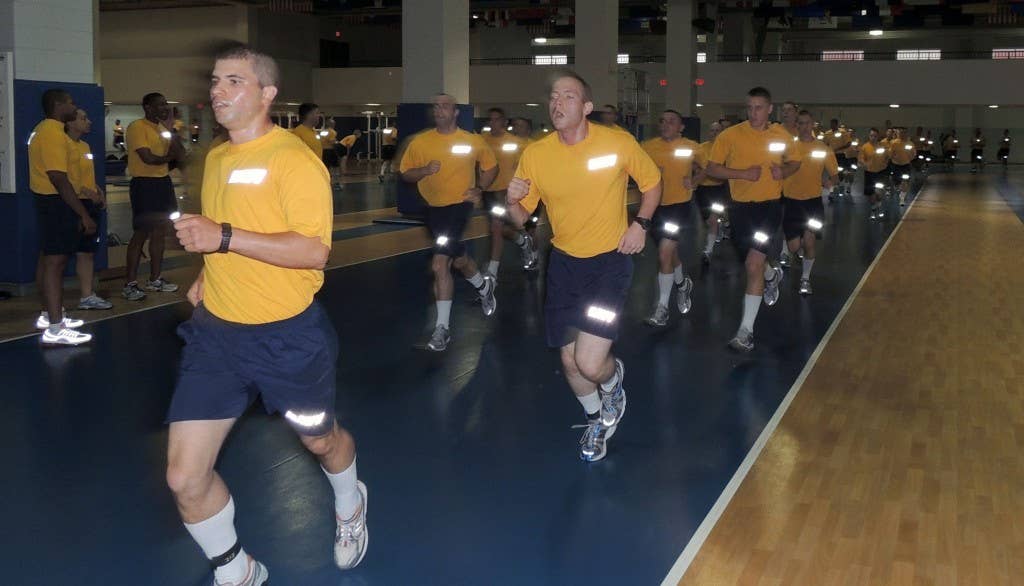 navy recruits running at boot camp