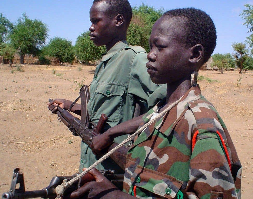 kids armed with ak-47 guns