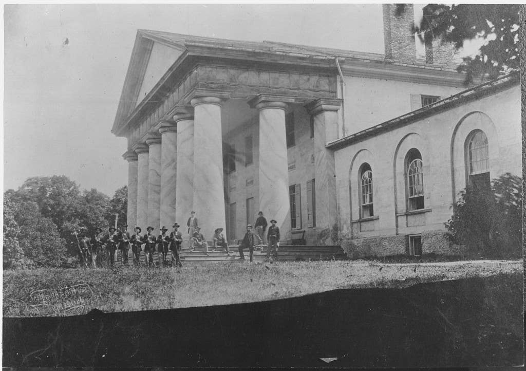 Union soldiers in front of the Lee family estate during the Civil War.