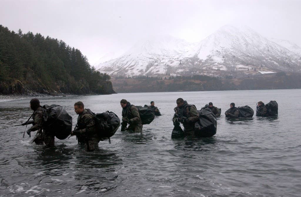 Kodiak, Alaska. (December 14, 2003) -- Advanced Cold Weather training not only allows operators to experience the physical stress of the environment, but how their equipment will operate or even sound, in adverse conditions. The training covers a broad area of tactics, techniques, and procedures necessary to operate efficiently where inclement weather is the norm. This includes, but not limited to, Cold Weather Survival, Land Navigation, and Stress-medical Conditioning.Special Operations is characterized by the use of small units with unique ability to conduct military actions that are beyond the capability of conventional military forces.