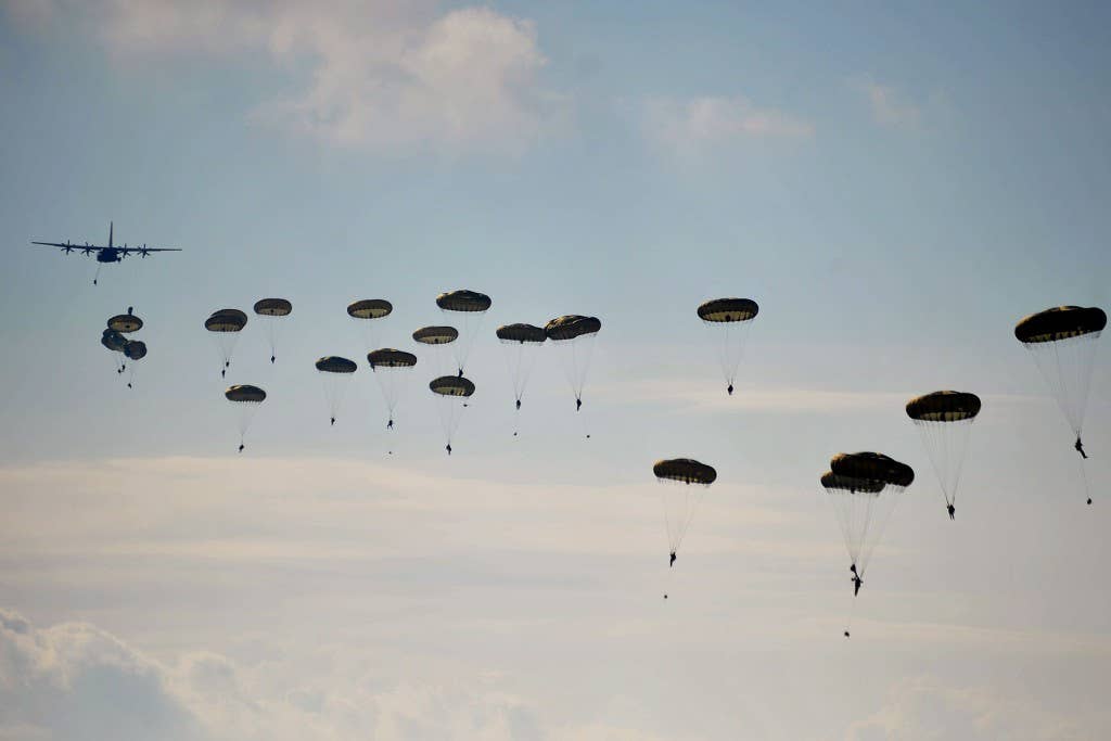 Paratroopers from Britain's 3rd Battalion, Parachute Regiment deploy from a French C160 Aircraft During Exercise Joint Warrior.