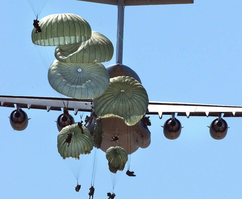 Paratroopers from the U.S. Army's 82nd Airborne Division jump from a C-17 Globemaster at Ft. Bragg, N.C., during Exercise Joint Forcible Entry in April 2005.