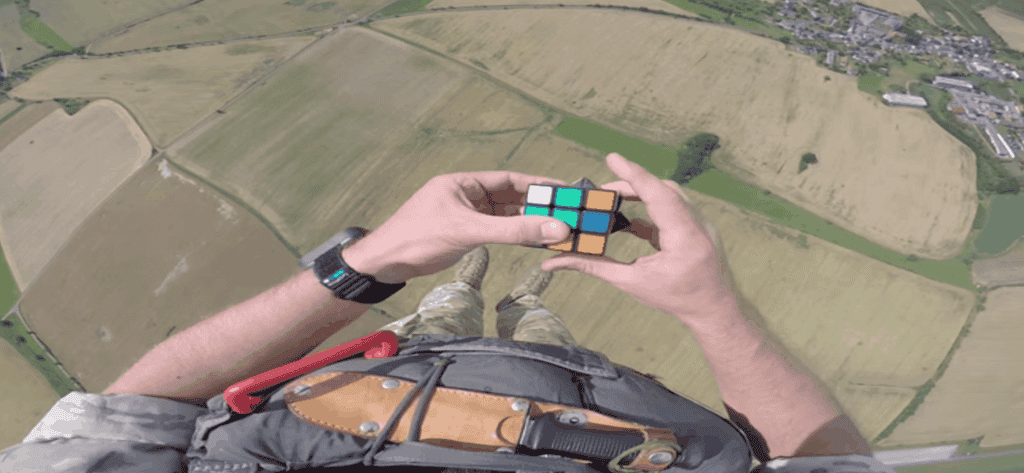 Here&#8217;s a video of a soldier jumping out of an airplane and solving a Rubik&#8217;s Cube