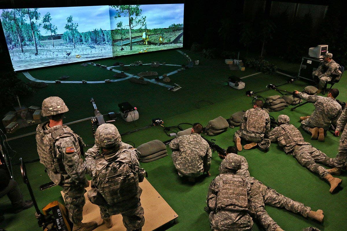 Soldiers train in the Engagement Skills Trainer 2000 April 6, 2015 in before heading to live-fire training at Saber Junction 15. Photo: US Army Sgt. 1st Class Caleb Barrieau