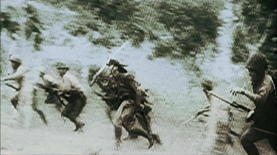 Actual frame of Japanese troops in a Banzai charge at Guadalcanal... with a sword.