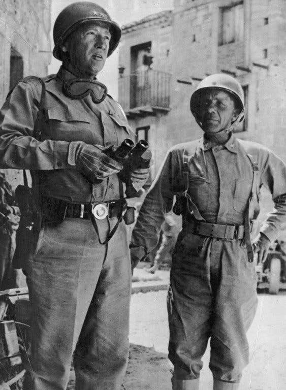 U.S. Army Gen. George S. Patton, Jr., and Brig. Gen. Theodore Roosevelt III talk in North Africa during the invasion in World War II. (Photo: U.S. Army)
