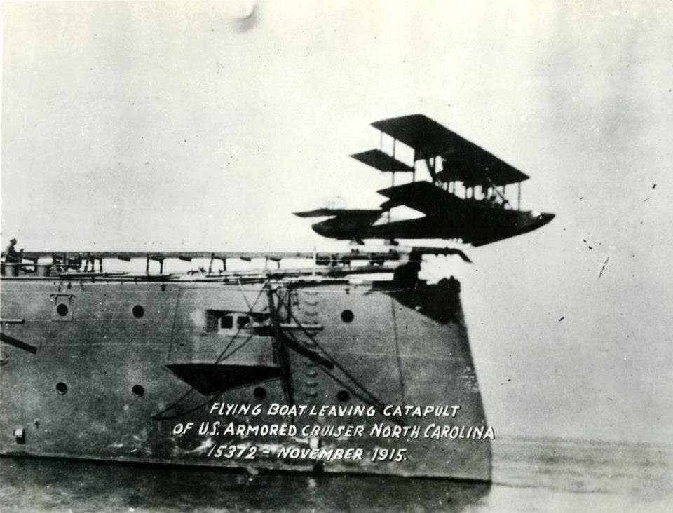 Curtiss AB-2 (C-2) Aircraft being catapulted from USS North Carolina (ACR-12) on 5 November 1915. (Image: Naval History  Heritage Command)
