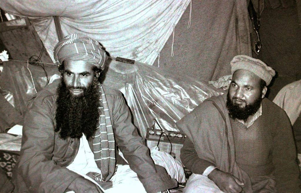 On the left, Abu Sayyaf as a mujahideen commander in 1984. Photo: Wikipedia/Erwin Franzen
