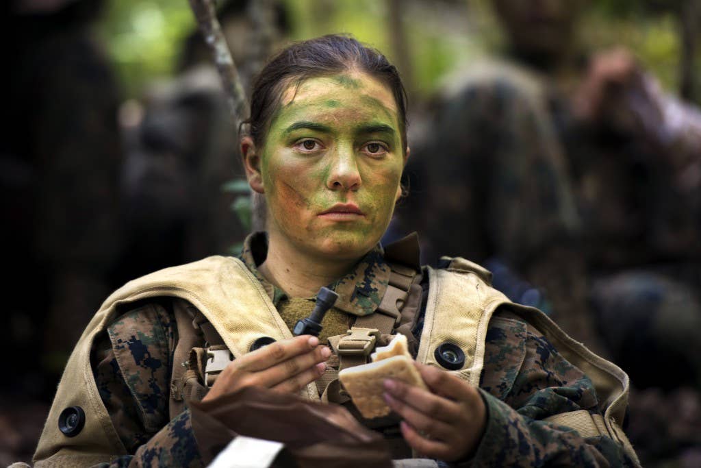 Pfc. Julia Carroll after a six-hour patrol during patrol week of Infantry Training Battalion near Camp Geiger, N.C (U.S. Marine Corps photo)