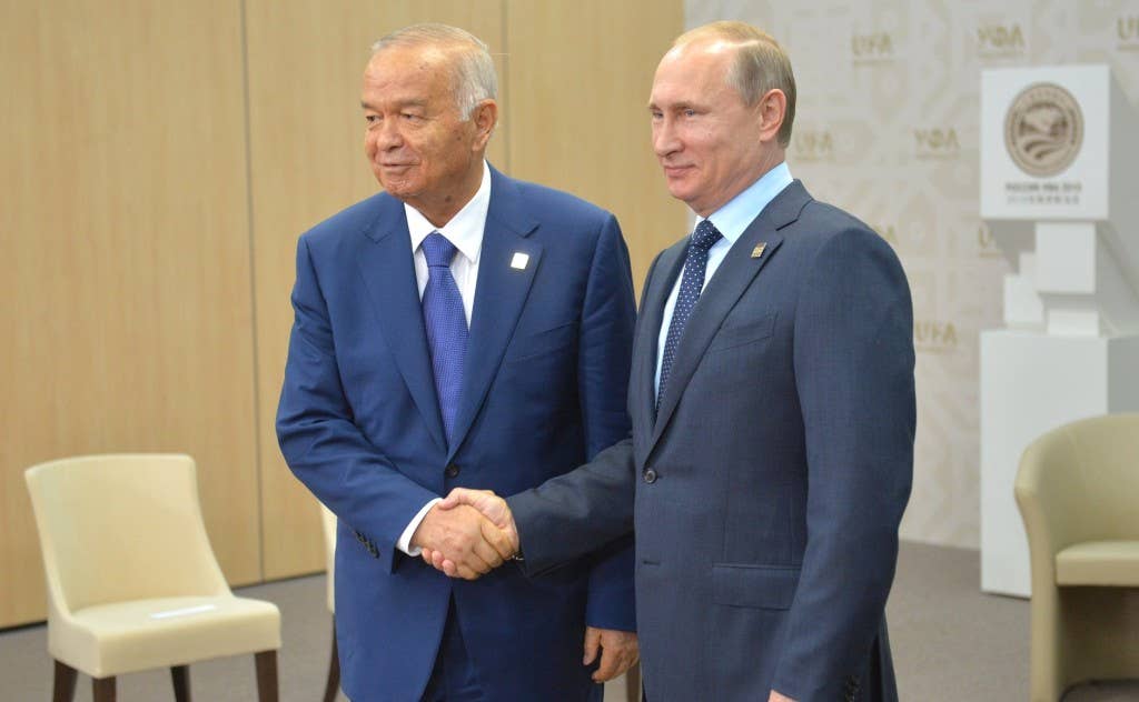 Uzbek dictator Islam Karim shaking hands with one of the few guys on the planet who scare him.