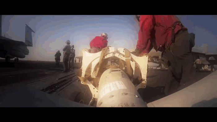 Aviation Ordnancemen take bombs to the F/A-18 Hornets. Joe Stephens/YouTube