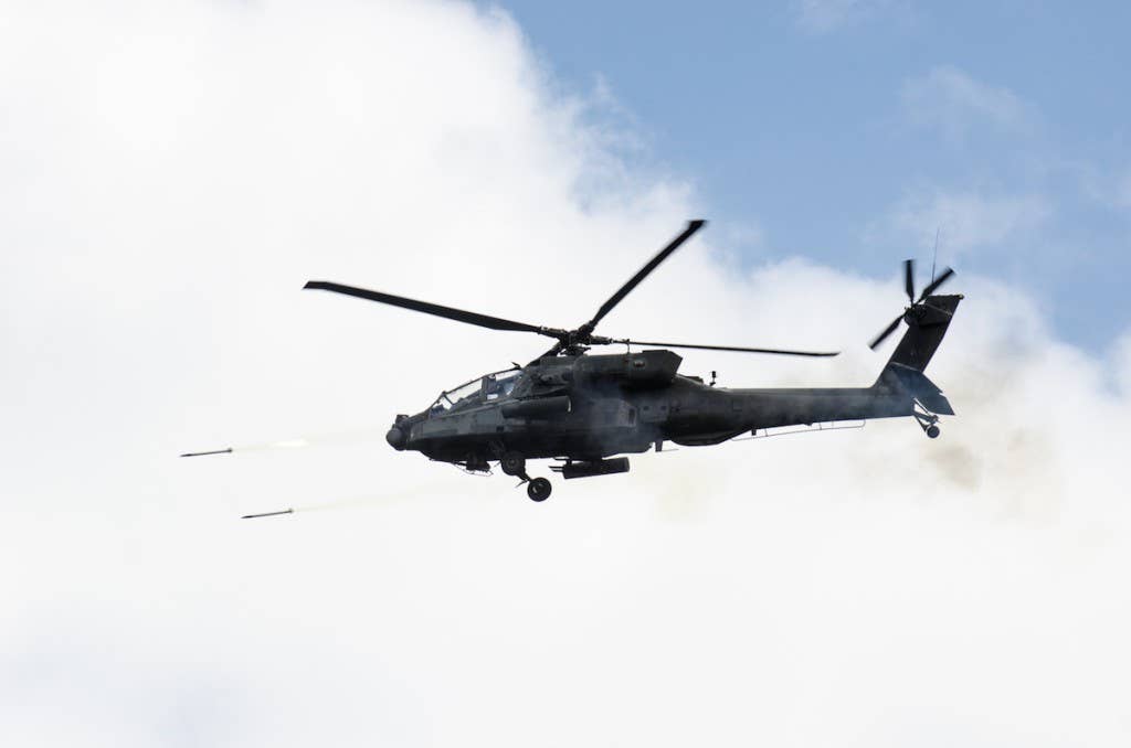 apache helicopter photos of firing missiles