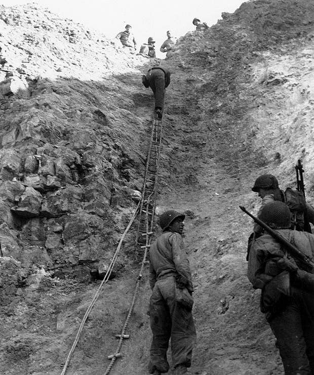 World War II Rangers demonstrate the ladders they used to scale Point du Hoc. Photo: US Army