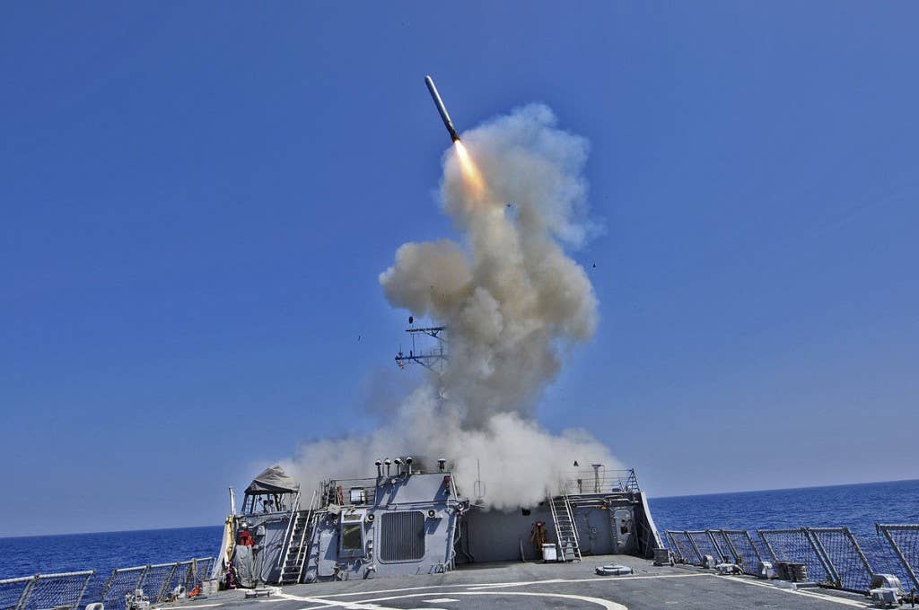 An Arleigh Burke-class destroyer launches a Tomahawk missile. | US Navy photo by Mass Communication Specialist 3rd Class Jonathan Sunderman