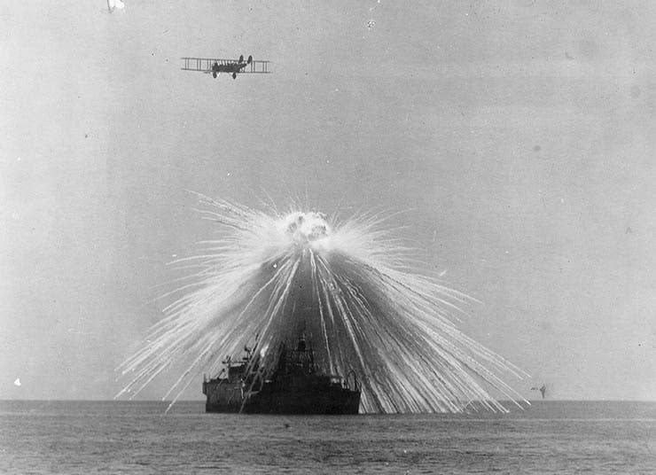 The USS Alabama is hit by a white phosphorous bomb dropped during a demonstration. Photo: US Navy History