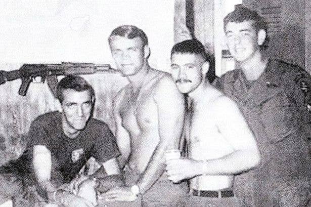 Robertson (far left) in 1968, the year he went missing in Vietnam