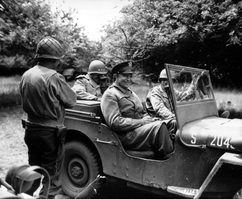 Gen. Dight D. Eisenhower rides in a Jeep in Normandy during World War II. Photo: US Army Signal Corps