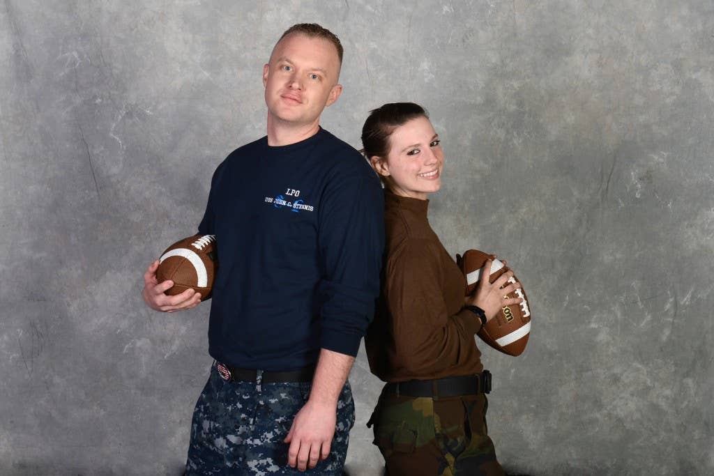 (Jan. 20, 2013) Culinary Specialist 1st Class Michael Farmer and Aviation Structural Mechanic Airman Presley Whitworth were selected to attend the Super Bowl and will depart from the aircraft carrier USS John C. Stennis (CVN 74) in the middle of the ship's deployment. (U.S. Navy photo by Mass Communication Specialist 2nd Class Lex T. Wenberg)