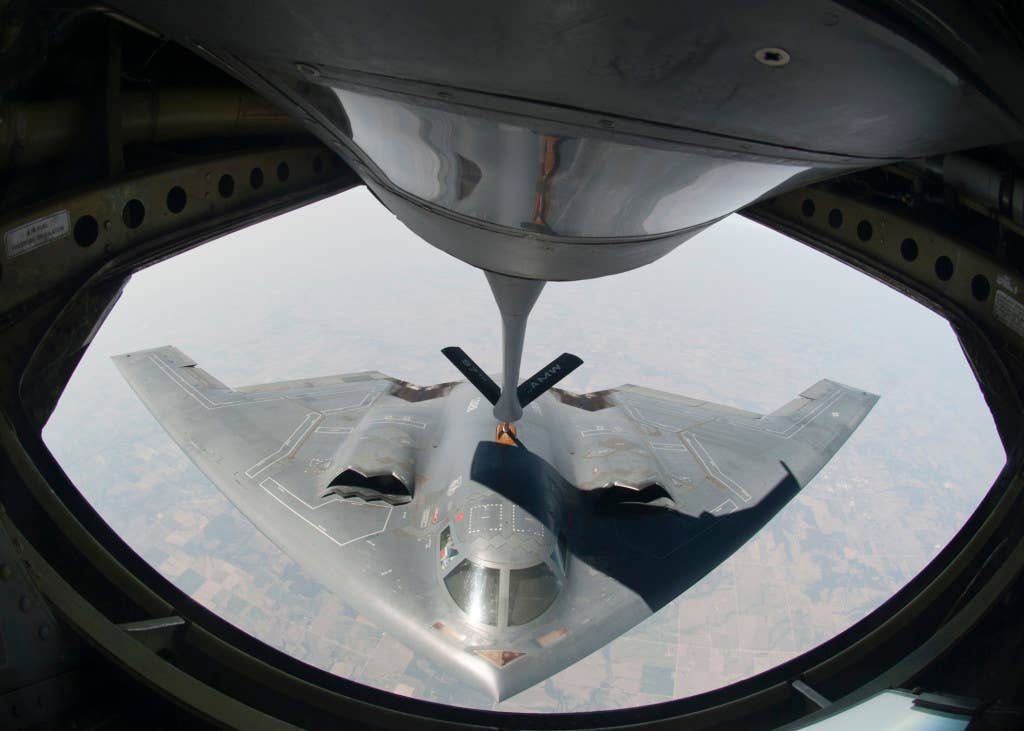 A KC-135 Stratotanker from Altus Air Force Base, Okla., refuels a B-2 Spirit Stealth Bomber from Whiteman AFB, Mo., during a refueling training mission (U.S. Air Force photo)