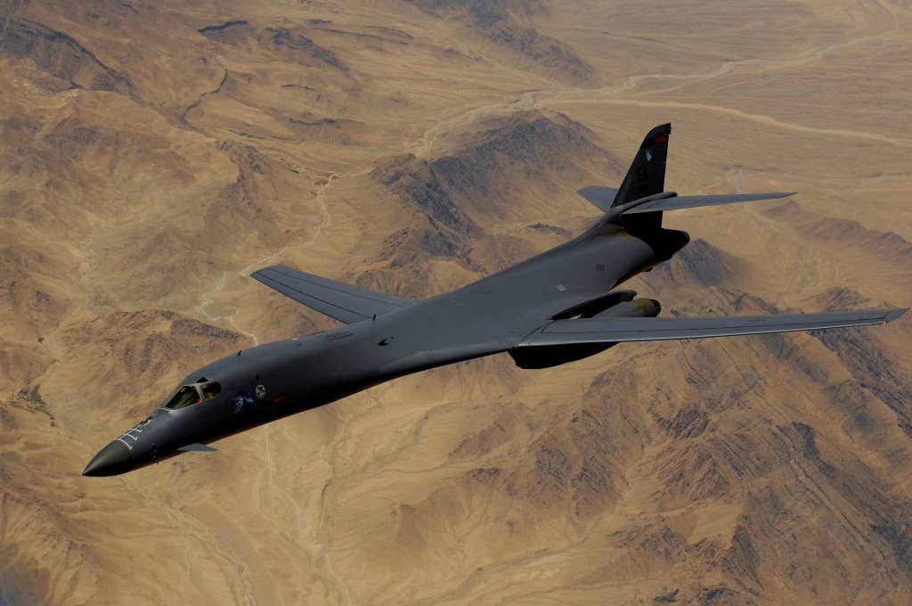 A U.S. Air Force B-1B Lancer aircraft banks away after receiving fuel from a KC-135R Stratotanker aircraft, not shown, during a mission over Afghanistan. (U.S. Air Force photo by Master Sgt. Andy Dunaway/Released)