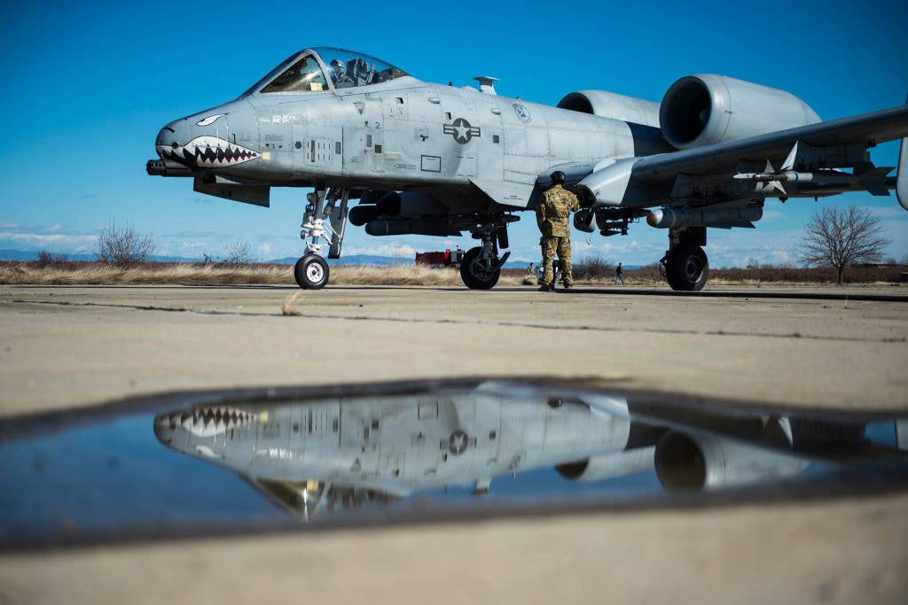 A member of the 100th Logistics Readiness Squadron refuels a 74th Expeditionary Fighter Squadron A-10C Thunderbolt II during forward area refueling point training at Plovdiv, Bulgaria | U.S. Air Force photo by Airman 1st Class Luke Kitterman