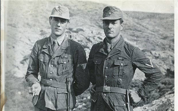 Patrick Leigh Fermor with Billy Moss in Crete, April 1944, wearing German uniforms. Public domain.