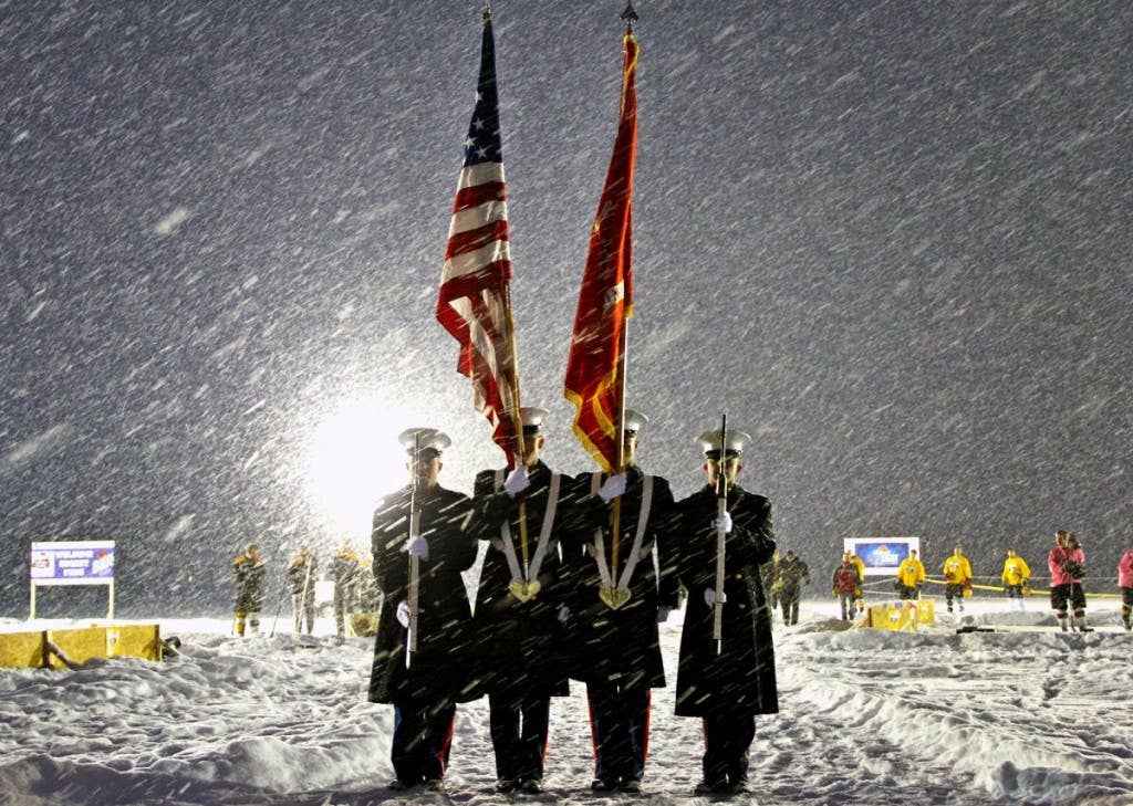 Marines From Recruiting Station Lansing, Recruiting Sub-Stations Grand Rapids North and South, participate in the opening ceremony for the Grand Rapids Pond Hockey Classic, Jan 25. | Photo by U.S. Marine Corps