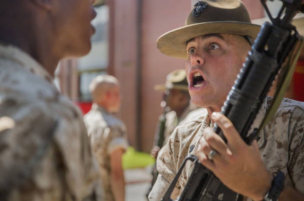 Drill Instructor Sgt. Jonathan B. Reeves inspects and disciplines recruits with Platoon 1085, Charlie Company, 1st Recruit Training Battalion, at Marine Corps Recruit Depot Parris Island, South Carolina. | Photo by U.S. Marine Corps