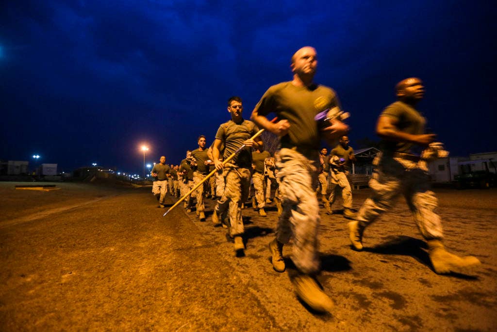 U.S. Marines with India Company, Battalion Landing Team 3rd Battalion, 1st Marine Regiment, 15th Marine Expeditionary Unit, participate in a formation run prior to a physical-training competition in Djibouti. The 15th MEU deployed in support of maritime security operations and theater security cooperation efforts in the U.S. 5th Fleet area of operations. (U.S. Marine Corps photo by Sgt. Jamean Berry)