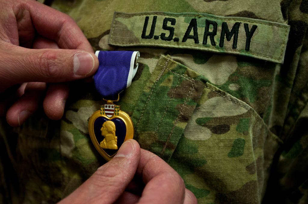 The Purple Heart, the oldest American military decoration for military merit, is awarded to members of the U.S. armed forces who have been killed or wounded in action against an enemy. It is also awarded to soldiers who have suffered maltreatment as prisoners of war. Purple Heart day is dedicated to honoring service members, past and present, who have received the Purple Heart medal.