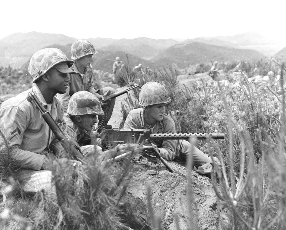 Four Marines man a machine gun in Korea, where they are serving with the 1st Marine Division. (Photo: U.S. Marine Corps)
