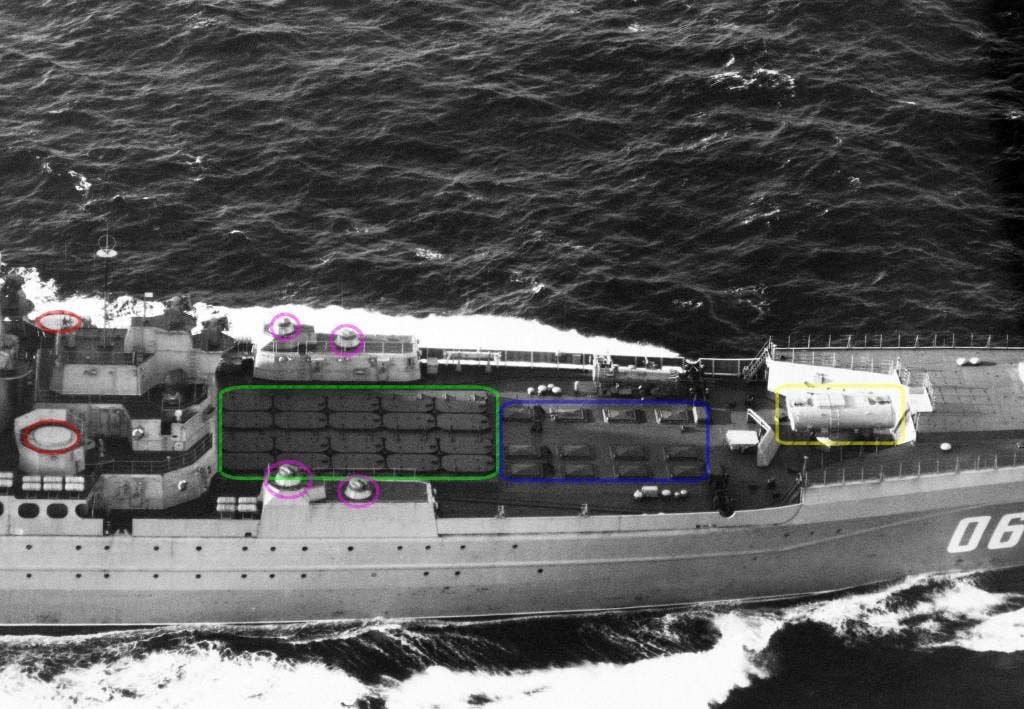 Aerial starboard view of the foredeck of a Kirov-class ship shows four single 30 mm Gatling guns (in purple), two pop-up (lowered) SA-N-4 SAM launchers (in red), 20 SS-N-19 cruise-missile launchers (in green), 12 SA-N-6 SAM launchers (in blue), and one twin SS-N-14 antisubmarine warfare/surface-to-surface missile launcher (in yellow). These weapons systems will be updated by 2020, Russia claims. | US Navy photo