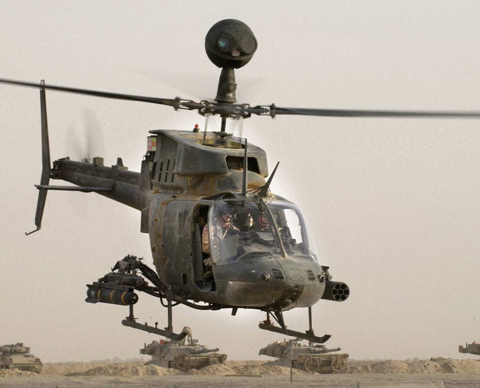 An OH-58D Kiowa Warrior helicopter from the 1st Infantry Division takes off on a mission from Forward Operation Base MacKenzie, Iraq. It is armed with an AGM-114 Hellfire and 7 Hydra 70 rockets. (U.S. Air Force photo)