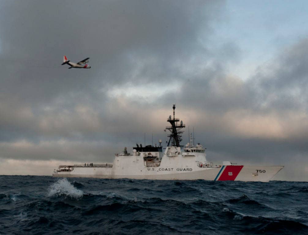 A U.S. Coast Guard HC-130 Hercules aircraft prepares to drop supplies aboard the national security cutter USCGC Bertholf in the Arctic Ocean Sept. 14, 2012, during a patrol in support of Arctic Shield 2012. (Photo: U.S. Coast Guard Public Affairs Specialist 1st Class Timothy Tamargo)